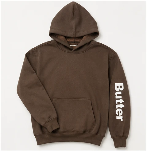 Front view of an espresso brown oversized hoodie with 'Butter' text on the sleeve, laid flat.