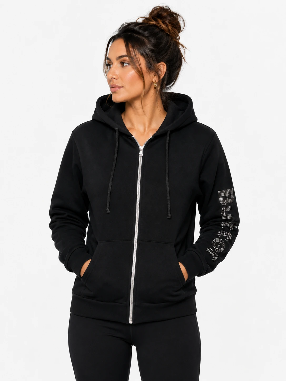 Model wearing a black zip-up hoodie with 'Butter' branding on the sleeve, shown from the front against a white background.