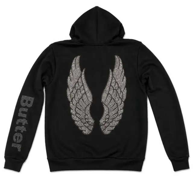 Back view of a black zip-up hoodie featuring large silver rhinestone wings on the back and Butter branding on the sleeve.