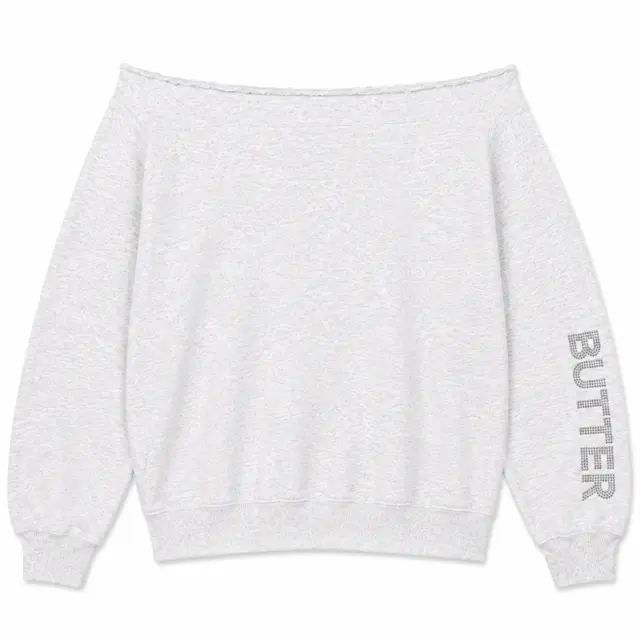 Light grey heathered off-the-shoulder sweatshirt with a wide neckline and BUTTER text in rhinestones on the right sleeve.